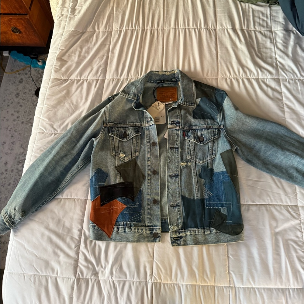 Denim jacket with patches and patterns